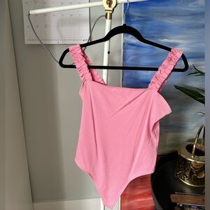 Sundays Best pink bodysuit. Perfect condition. Worn 2-3 times!